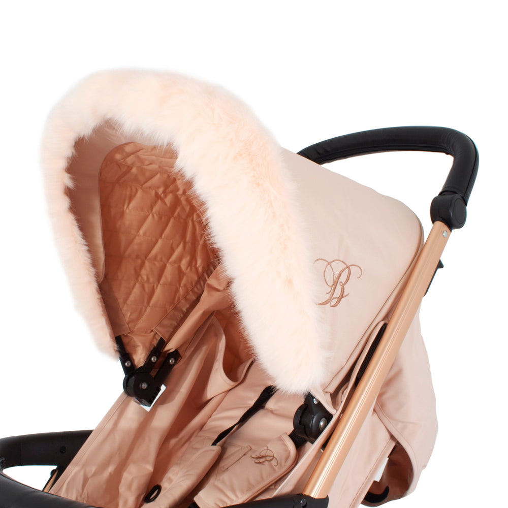 Luxurious blush faux fur pram hood trim